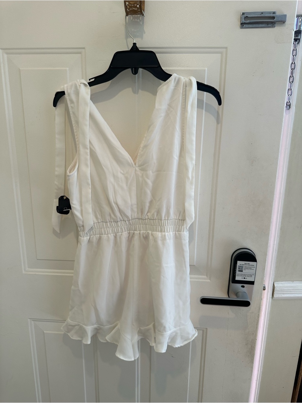 City Studio White V-Neck Romper with Ruffle Hem and Tie Straps